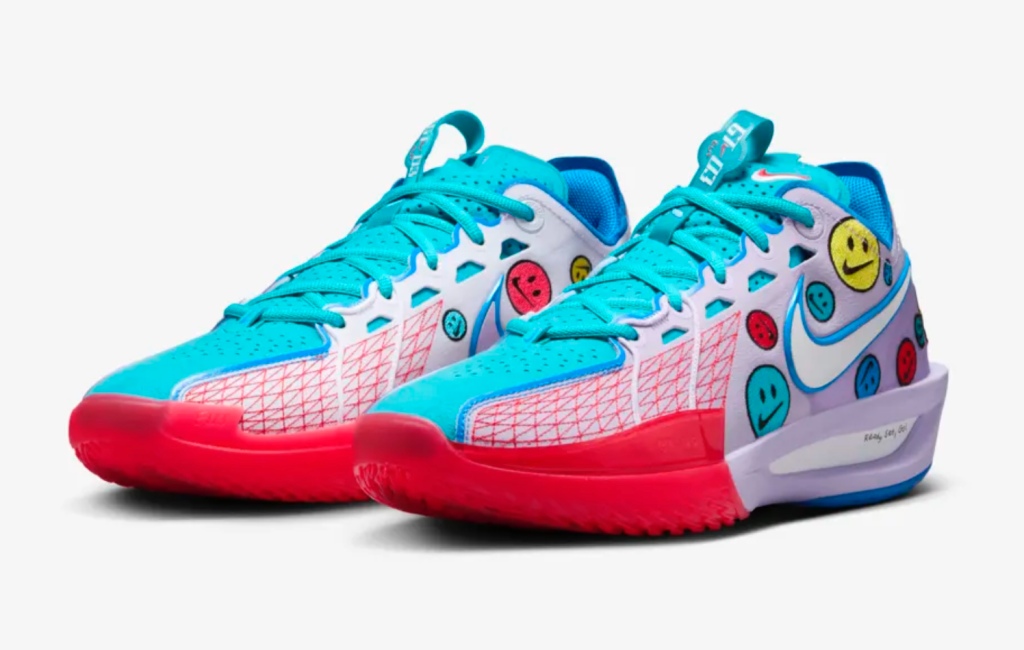 Colorful player-edition sneakers from Jewell Loyd featuring red, blue and yellow smiley faces with Nike swooshes